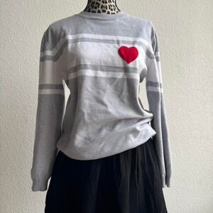Grey and white sweater with heart patch